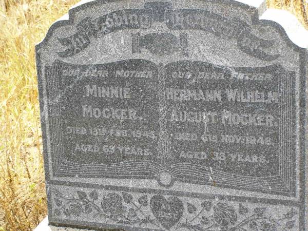 Minnie MOCKER,  | mother,  | died 13? Feb 1945 aged 69 years;  | Hermann Wilhelm August MOCKER,  | father,  | died 6 Nov 1946 aged 83? years;  | Milbong St Luke's Lutheran cemetery, Boonah Shire  | 