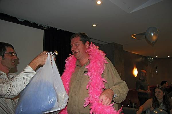 Ms DSTC receives her ceremonial feather boa,  | DSTC Farewell Symposium, 28 July 2005  | 