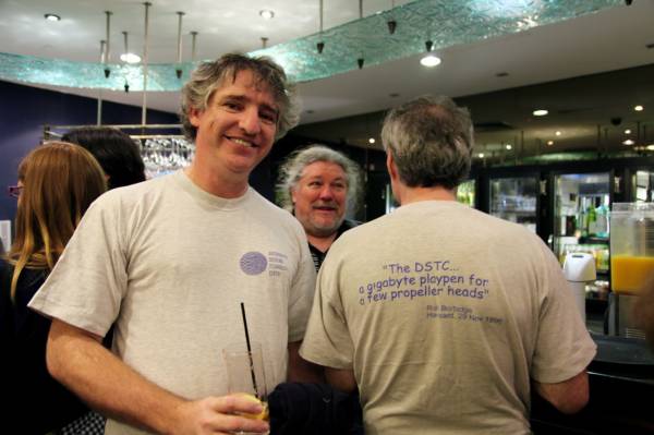 David Leonard, Bill Segall, wearing matching T-shirts front and rear views  | 