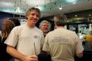 David Leonard, Bill Segall, wearing matching T-shirts front and rear views 