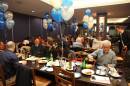 Everyone sitting down to eat 