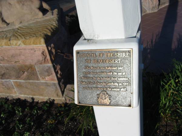 This flagpole was fashioned and hand hewn entirely with the use of a broadaxe by the lamented local axeman,  | Billy (Con) Drumley (probably in 1918) and is a testament to his unique skill.  | Beaudesert WWI war memorial  | 