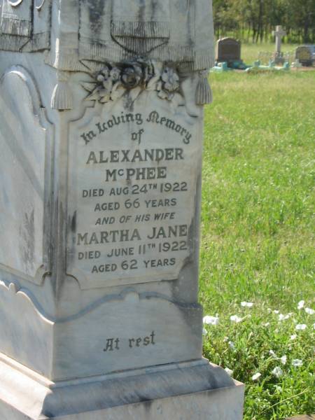 Alexander MCPHEE,  | died 24 Aug 1922 aged 66 years;  | Martha Jane,  | wife,  | died 11 June 1922 aged 62 years;  | Bell cemetery, Wambo Shire  | 