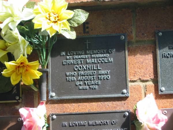Ernest Malcolm COXHILL,  | husband,  | died 15 Aug 1990 aged 64 years;  | Bribie Island Memorial Gardens, Caboolture Shire  | 