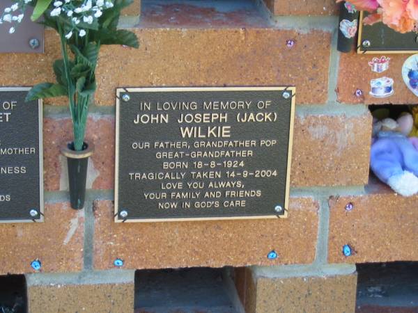 John Joseph (Jack) WILKIE,  | father grandfather pop great-grandfather,  | born 18-8-1924,  | died tragically 14-9-2004;  | Bribie Island Memorial Gardens, Caboolture Shire  | 