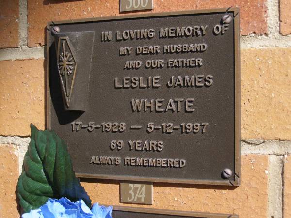 Leslie James WHEATE,  | husband father,  | 17-5-1928 - 5-12-1997 aged 69 years;  | Brookfield Cemetery, Brisbane  | 