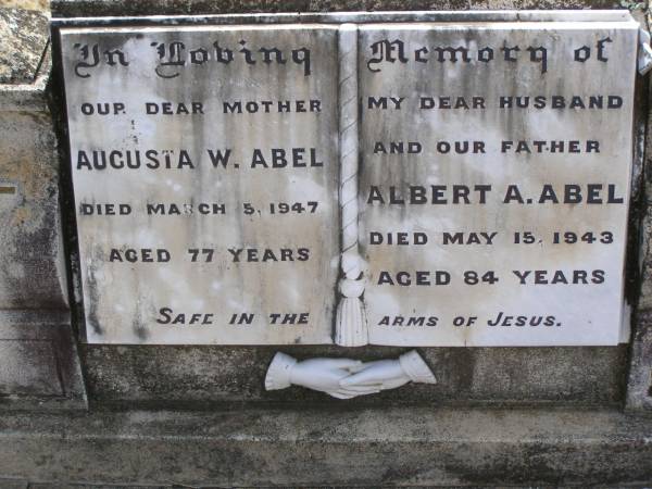 Augusta W. ABEL, mother,  | died 5 March 1947 aged 77 years;  | Albert A. ABEL, husband father,  | died 15 May 1943 aged 84 years;  | Douglas Lutheran cemetery, Crows Nest Shire  | 