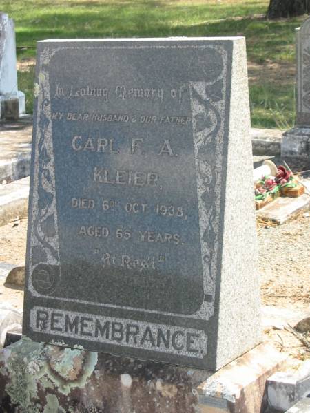 Carl F.A. KLEIER,  | husband father,  | died 6 Oct 1938 aged 65 years;  | Dugandan Trinity Lutheran cemetery, Boonah Shire  | 
