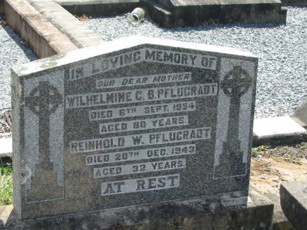 Wilhelmine C.B. PFLUGRADT,  | mother,  | died 6 Sept 1954 aged 80 years;  | Reinhold W. PFLUGRADT,  | died 20 Dec 1943 aged 32 years;  | Dugandan Trinity Lutheran cemetery, Boonah Shire  | 