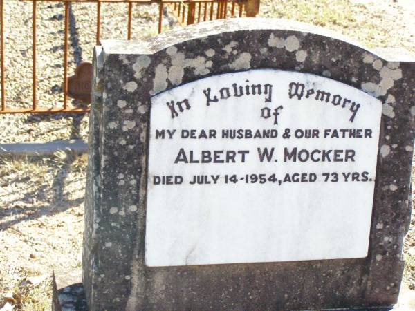 Albert W. MOCKER, husband father,  | died 14 July 1954 aged 73 years;  | Fernvale General Cemetery, Esk Shire  | 