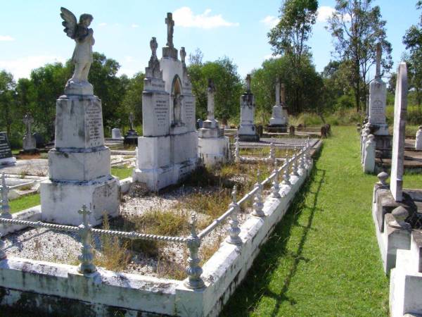 children of Michael & Kate ENRIGHT;  | Patrick James, aged 4 years 7 months;  | Mary Teresa, aged 2 years 10 months;  | Lucy Cecilia, aged 1 year;  | John Vincent, aged 10 months;  | Rev Thomas ENRIGHT,  | died 17 Dec 1919 aged 58 years;  | Rev James ENRIGHT,  | died 24 May 1921 aged 68 years;  | Kathleen, wife of Jack OXENHAM,  | daughter of Michael & Kate ENRIGHT,  | died 30 June 1925 aged 27 years;  | Gleneagle Catholic cemetery, Beaudesert Shire  | 