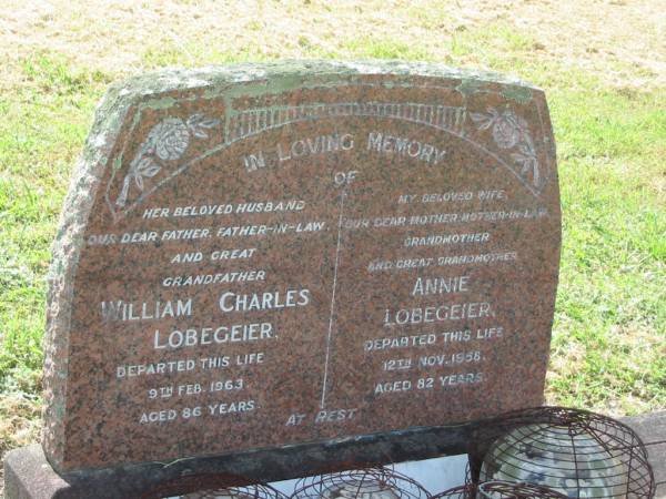 William Charles LOBEGEIER,  | husband father father-in-law great-grandfather,  | died 9 Feb 1963 aged 86 years;  | Annie LOBEGEIER,  | wife mother mother-in-law grandmother great-grandmother,  | died 12 Nov 1958 aged 82 years;  | Goomeri cemetery, Kilkivan Shire  | 