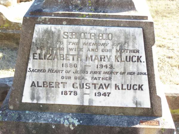 Elizabeth Mary KLUCK, wife mother,  | 1880 - 1943;  | Albert Gustav KLUCK, father,  | 1878 - 1947;  | Helidon Catholic cemetery, Gatton Shire  | 