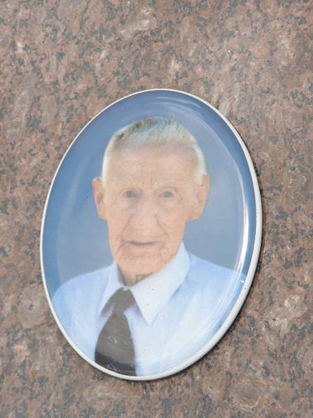 R.A. (Reg) MCKENNA,  | died 11 Oct 2003 aged 87 years,  | husband of Ev,  | dad of Reg, Trevor, Pam & families;  | Howard cemetery, City of Hervey Bay  | 