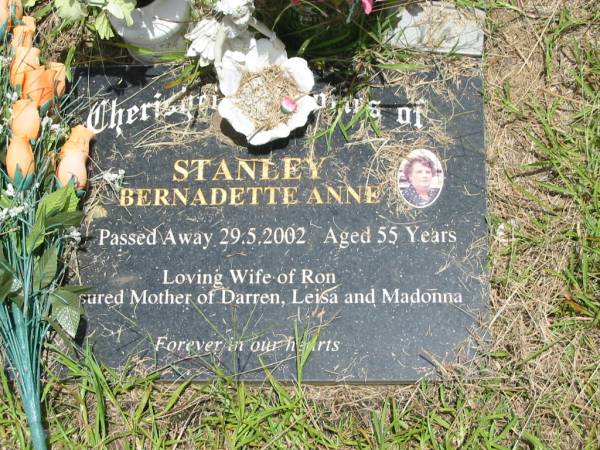 Bernadette Anne STANLEY,  | died 29-5-2002 aged 55 years,  | wife of Ron,  | mother of Darren, Leisa & Madonna;  | Howard cemetery, City of Hervey Bay  | 