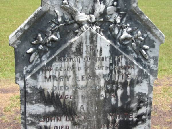 parents;  | Mary Leah WHITE,  | died 30 Jan 1922 aged 61 years;  | John Lindsay WHITE,  | died 1 June 1922 aged 66 years;  | Ada Leah WHITE,  | sister,  | died March 1898 aged 7 months;  | Howard cemetery, City of Hervey Bay  | 