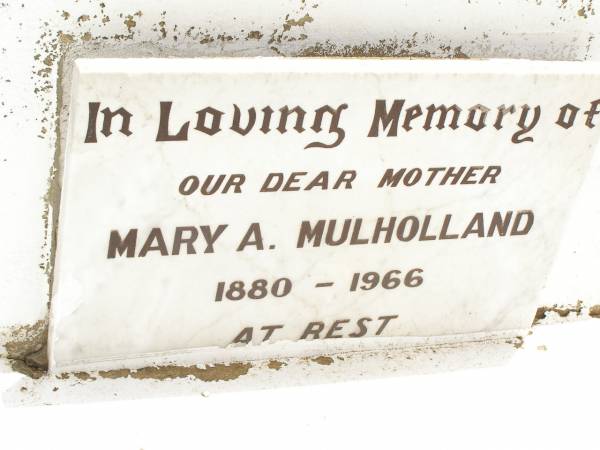 George E. MULHOLLAND,  | husband father,  | 1880 - 1940;  | Mary A.MULHOLLAND,  | mother,  | 1880 - 1966;  | Jandowae Cemetery, Wambo Shire  | 