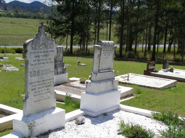 Emily EVERETT, wife mother,  | died 16 Jan 1914 aged 42 years;  | Daisy Evelyn EVERETT,  | daughter sister,  | died 1 July 1907 aged 3 years 6 months;  | William EVERETT, husband father,  | died 12 Feb 1931 aged 67 years;  | Kandanga Cemetery, Cooloola Shire  | 