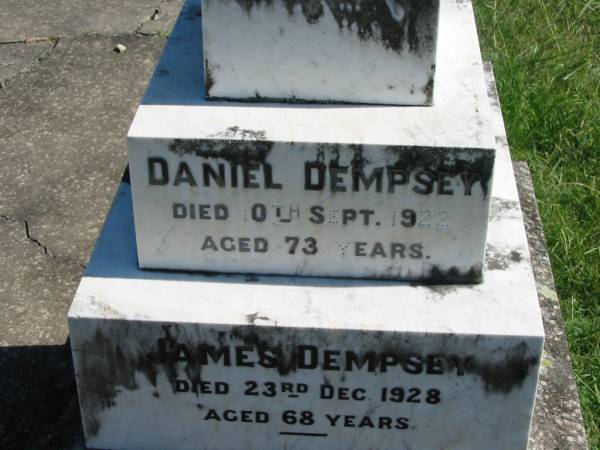 Rebecca DEMPSEY,  | born Scotland,  | died 24 May 1900 aged 70 years;  | George DEMPSEY, son,  | died 20 Oct 1915 aged 52 years;  | James DEMPSEY, husband,  | died 30 March 1865 aged 40 years,  | interred in Brisbane;  | John DEMPSEY,  | born Skibbereen, Country Cork, Ireland,  | died 11 May 1917 aged 64 years;  | Bridget DEMPSEY, wife,  | born Ballymooney, Kings County, Ireland,  | died 14 Dec 1879 aged 29 years;  | Kevin FITTON, grandson,  | aged 5 months;  | Daniel DEMPSEY,  | died 10 Sept 1922 aged 73 years;  | James DEMPSEY,  | died 23 Dec 1928 aged 68 years;  | Mary Ellen FITTON, wife mother,  | died 13 Sept 1947 aged 69 years;  | St John's Catholic Church, Kerry, Beaudesert Shire  | 