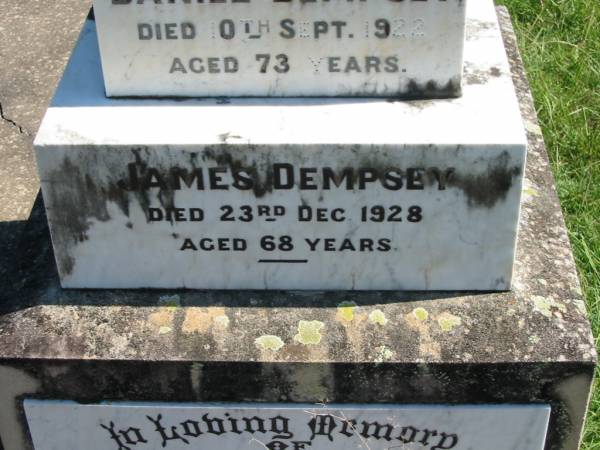 Rebecca DEMPSEY,  | born Scotland,  | died 24 May 1900 aged 70 years;  | George DEMPSEY, son,  | died 20 Oct 1915 aged 52 years;  | James DEMPSEY, husband,  | died 30 March 1865 aged 40 years,  | interred in Brisbane;  | John DEMPSEY,  | born Skibbereen, Country Cork, Ireland,  | died 11 May 1917 aged 64 years;  | Bridget DEMPSEY, wife,  | born Ballymooney, Kings County, Ireland,  | died 14 Dec 1879 aged 29 years;  | Kevin FITTON, grandson,  | aged 5 months;  | Daniel DEMPSEY,  | died 10 Sept 1922 aged 73 years;  | James DEMPSEY,  | died 23 Dec 1928 aged 68 years;  | Mary Ellen FITTON, wife mother,  | died 13 Sept 1947 aged 69 years;  | St John's Catholic Church, Kerry, Beaudesert Shire  | 