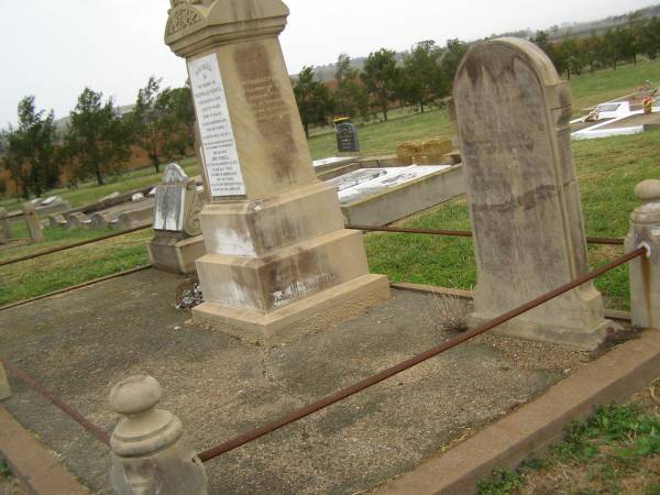 Theophilus HOWELL,  | died 11 March 1902 aged 77 years,  | born in Wales,  | lived in Qld 50 years;  | Anne HOWELL,  | wife,  | died 13 Jan 1927 in 85th year,  | residing in Qld 74 years;  | Joseph Charles HOWELL,  | born Killarney 24-10-1872,  | died Brisbane 11-3-1940,  | buried Toowong;  | William Arthur Melrose Octavius,  | son of Theophilus & Ann HOWELL of this place,  | died 1 April 1881 aged 11 months 11 days;  | Anna Douglas,  | wife of T.J. HOWELL  Melrose ,  | died 7 Oct 1928 aged 66 years;  | Theophilus John HOWELL,  | born Fassifern Qld 15 July 1862,  | died Bordertown SA 17 Dec 1935;  | Archibald Dunbar HOWELL,  | born 17 July 1905,  | died 25 March 1934;  | Aisla Grace HOWELL,  | born 8 Oct 1910,  | died 8 Aug 1911;  | Killarney cemetery, Warwick Shire  | 