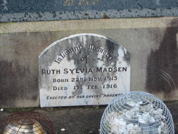 Christina MADSEN,  | died 25 Aug 1934 aged 62 years;  | Mads MADSEN,  | died 22 Jan 1931 aged 61 years;  | Ruth Sylvia MADSEN,  | born 22 Nov 1915,  | died 1 Feb 1916,  | erected by parents;  | Killarney cemetery, Warwick Shire  | 