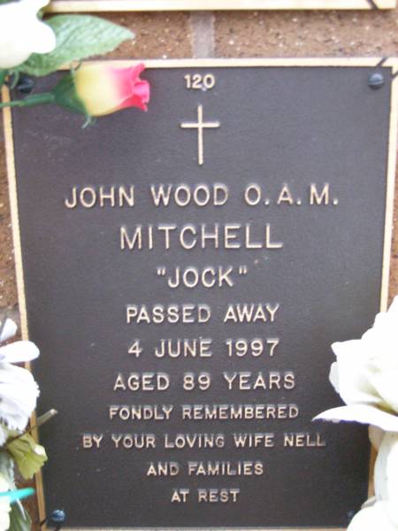 John Wood (Jock) MITCHELL,  | died 4 June 1997 aged 89 years,  | wife Nell;  | Lawnton cemetery, Pine Rivers Shire  | 