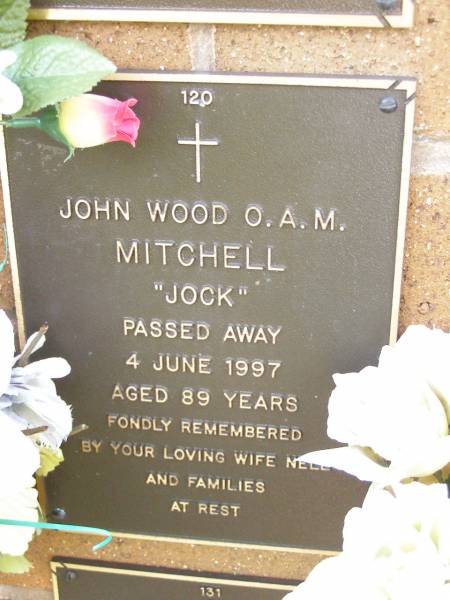 John Wood (Jock) MITCHELL,  | died 4 June 1997 aged 89 years,  | wife Nell;  | Lawnton cemetery, Pine Rivers Shire  | 