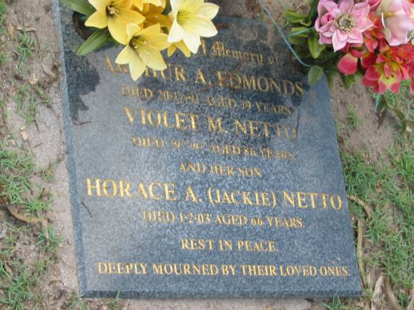 Arthur A. EDMONDS,  | died 20-12-91 aged 79 years;  | Violet M. NETTO,  | died 29-7-97 aged 86 years;  | Horace A. (Jackie) NETTO,  | son,  | died 1-2-03 aged 66 years;  | Lawnton cemetery, Pine Rivers Shire  | 