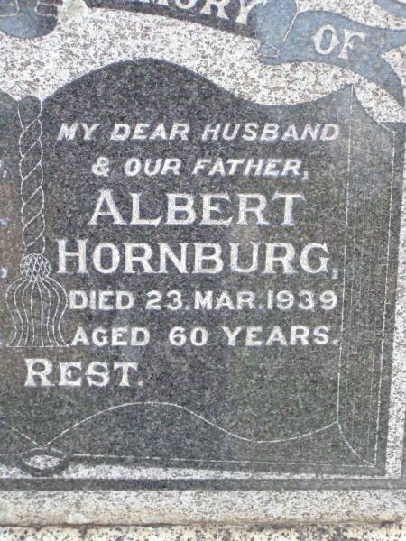 Albert HORNBURG, husband father,  | died 23 Mar 1939 aged 60 years;  | Janet M. HORNBURG, mother,  | died 8 Mar 1965 aged 82 years;  | Alfred George HORNBURG,  | 1902 - 1986;  | Ma Ma Creek Anglican Cemetery, Gatton shire  | 