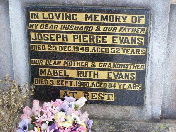 Joseph Pierce EVANS, husband father,  | died 29 Dec 1949 aged 52 years;  | Mabel Ruth EVANS, mother grandmother,  | died 5 Sept 1988 aged 84 years;  | Ma Ma Creek Anglican Cemetery, Gatton shire  | 