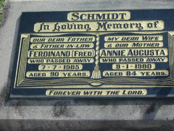 SCHMIDT;  | Ferdinand (Fred), father father-in-law,  | died 7-7-1985 aged 90 years;  | Annie Augusta, wife mother,  | died 9-1-1980 aged 84 years;  | Marburg Lutheran Cemetery, Ipswich  | 