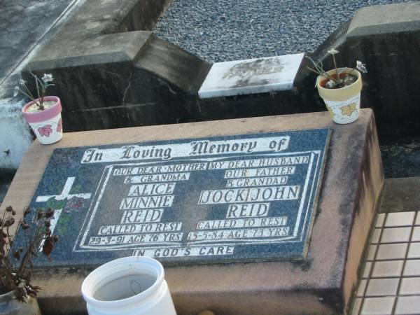 Alice Minnie REID,  | died 29-3-91 aged 76 years,  | mother grandma;  | (Jock) John REID,  | died 15-5-84 aged 73 years,  | husband father grandad;  | Marburg Lutheran Cemetery, Ipswich  | 