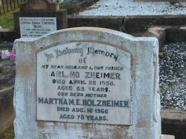 Carl HOLZHEIMER, husband father,  | died 28 April 1950 aged 63 years;  | Martha M.E. HOLZHEIMER, mother,  | died 16 Aug 1966 aged 78 years;  | Marburg Lutheran Cemetery, Ipswich  | 