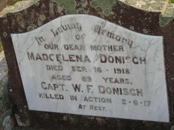 Madgelena DONISCH, mother,  | died 16 Sept 1918 aged 69 years;  | Capt. W.F. DONISH,  | killed in action 2-6-17;  | Marburg Lutheran Cemetery, Ipswich  | 