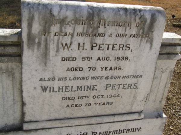 W.H. PETERS,  | husband father,  | died 5 Aug 1939 aged 70 years;  | Wilhelmine PETERS,  | wife mother,  | died 16 Oct 1944 aged 70 years;  | Meringandan cemetery, Rosalie Shire  | 