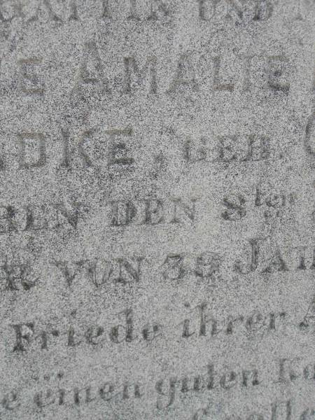 Emelie Amalie Mathilde BADKE, nee GUNTHER,  | wife mother,  | died 8 Feb 1888 aged 39 years 4 months;  | August Ferdinand BADKE,  | husband father,  | died 27 Jan 1928 aged 81 years;  | Milbong St Luke's Lutheran cemetery, Boonah Shire  | 