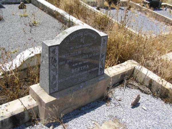 Wilhelm E. DULL,  | husband,  | died 11 Apr 1948 aged 52 years;  | Bertha,  | wife,  | died 15 July 1965 aged 66 years;  | Milbong St Luke's Lutheran cemetery, Boonah Shire  | 