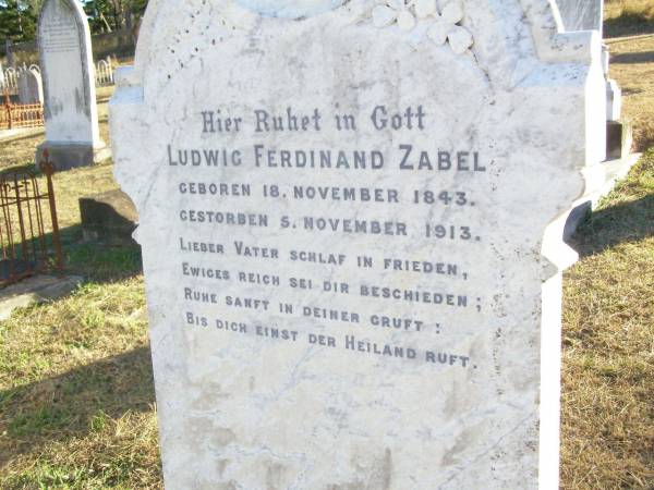 Ludwig Ferdinand ZABEL, father,  | born 18 Nov 1843 died 5 Nov 1913;  | Fredericke ZABEL, mother,  | born 21 May 1849 died 21 May 1915;  | Ludwig & Friedericke arrived 3-11-1870,  | reunion 2-11-1985;  | St Johns Evangelical Lutheran Church, Minden, Esk Shire  | 