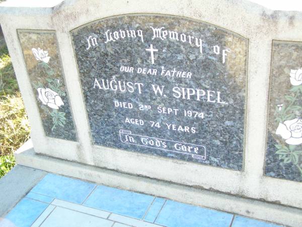 August W. SIPPEL, father grand-dad,  | died 2 Sept 1974 aged 74 years;  | Emma SIPPEL, wife mother grandma,  | died 9 Jan 1969 aged 67 years;  | St Johns Evangelical Lutheran Church, Minden, Esk Shire  | 
