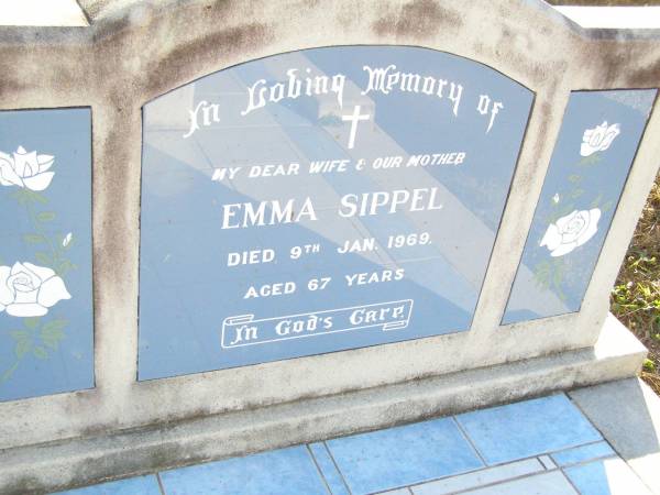 August W. SIPPEL, father grand-dad,  | died 2 Sept 1974 aged 74 years;  | Emma SIPPEL, wife mother grandma,  | died 9 Jan 1969 aged 67 years;  | St Johns Evangelical Lutheran Church, Minden, Esk Shire  | 