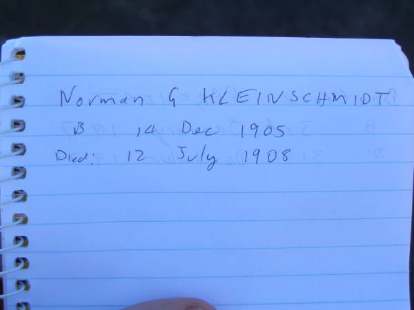 Norman G. KLEINSCHMIDT,  | born 14 Dec 1905,  | died 12 July 1908;  | Carl Friedrich KLEINSCHMIDT,  | born 7 Sept 1820,  | died 19 Aug 1908;  | Justine Caroline KLEINSCHMIDT (nee BRAUN),  | wife,  | born 24 Oct 1830,  | died 25 July 1909;  | Pimpama Island cemetery, Gold Coast  | 