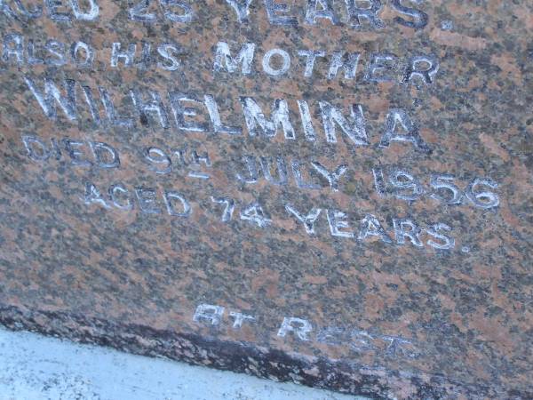Vincent C. KLEINSCHMIDT,  | son,  | died 13 Jan 1938 aged 25 years;  | Wilhelmina,  | mother,  | died 9 July 1956 aged 74 years;  | Pimpama Island cemetery, Gold Coast  | 