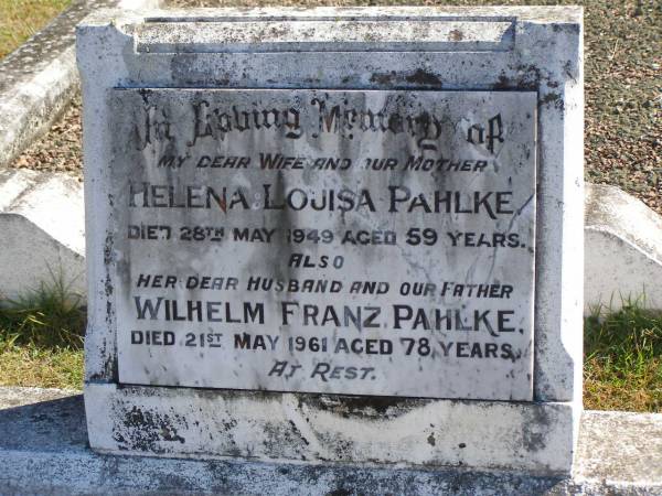 Helena Louisa PAHLKE,  | wife mother,  | died 28 May 1949 aged 59 years;  | Wilhelm Franz PAHLKE,  | husband father,  | died 21 May 1961 aged 78 years;  | Pimpama Island cemetery, Gold Coast  | 