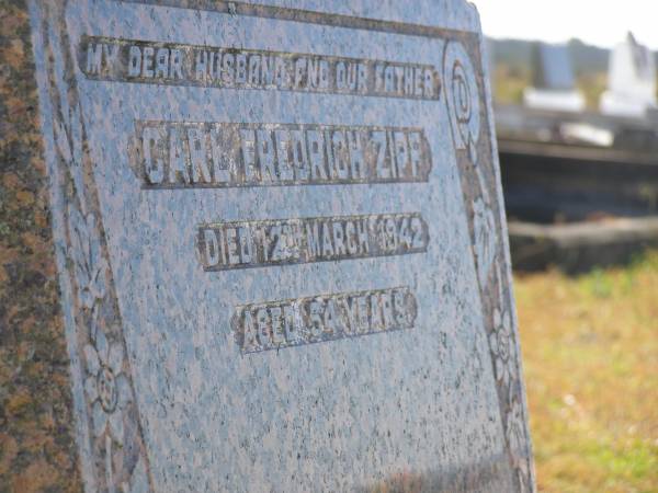 Carl Fredrich ZIPF,  | husband father  | died 12 March 1942 aged 54 years;  | Pimpama Island cemetery, Gold Coast  | 