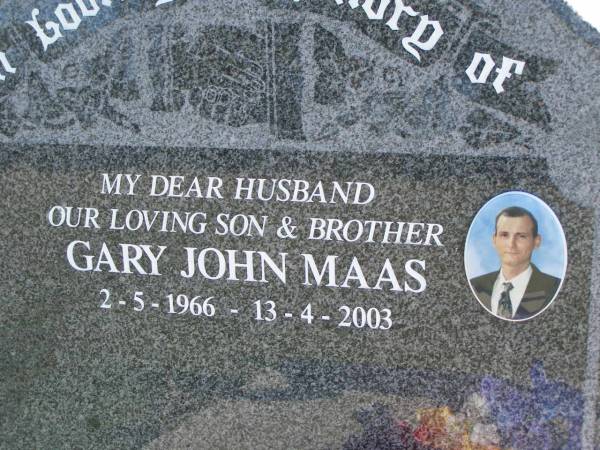 Gary John MAAS,  | husband son brother,  | 2-5-1966 -13-4-2003;  | Pimpama Island cemetery, Gold Coast  | 