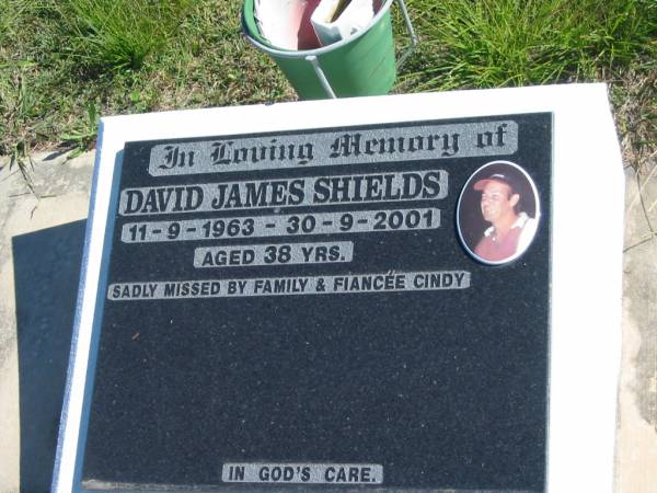 David James SHIELDS,  | 11-9-1963 - 30-9-2001 aged 38 years,  | missed by family and fiancee Cindy;  | Pimpama Island cemetery, Gold Coast  | 