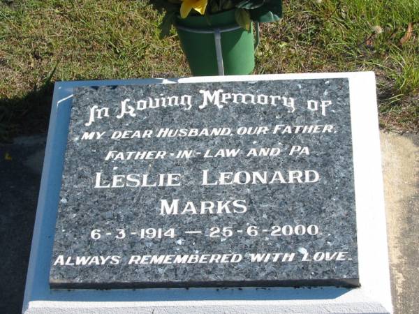 Leslie Leonard MARKS,  | husband father father-in-law pa,  | 6-3-1914 - 25-6-2000;  | Pimpama Island cemetery, Gold Coast  | 