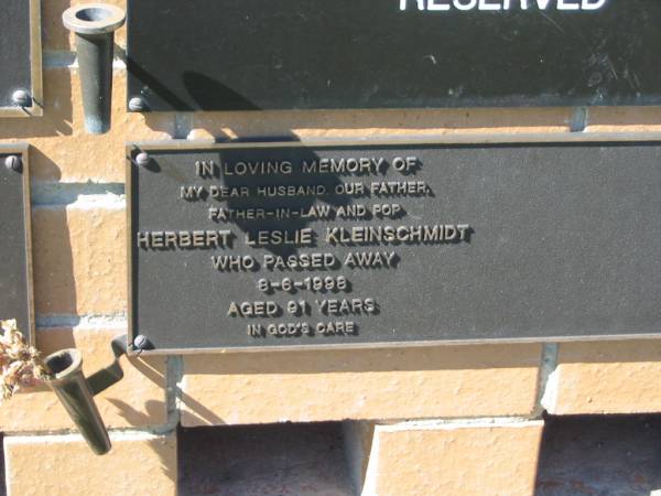 Herbert Leslie KLEINSCHMIDT,  | husband father father-in-law pop,  | died 8-6-1998 aged 91 years;  | Pimpama Island cemetery, Gold Coast  | 