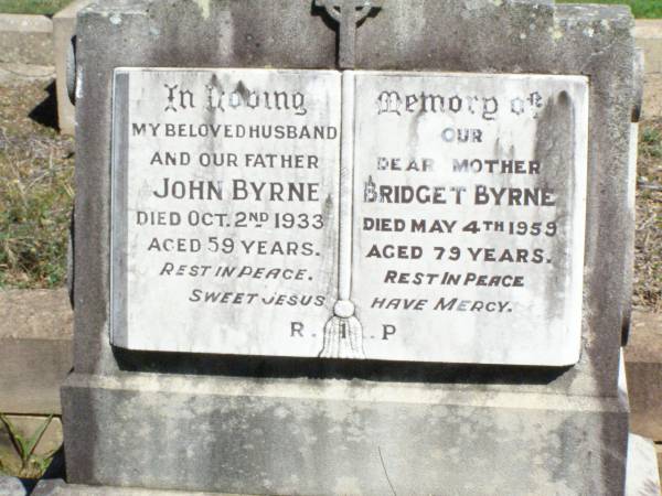 John BYRNE, husband father,  | died 2 Oct 1933 aged 59 years;  | Bridget BYRNE, mother,  | died 4 May 1959 aged 79 years;  | Pine Mountain Catholic (St Michael's) cemetery, Ipswich  | 
